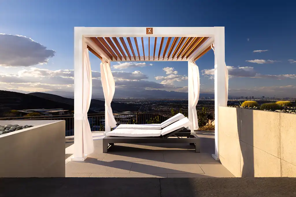 photo of a StuXure NorCal outdoor privacy cabana with lounge chairs with a beautiful California vista in the background in Redwood City photo.