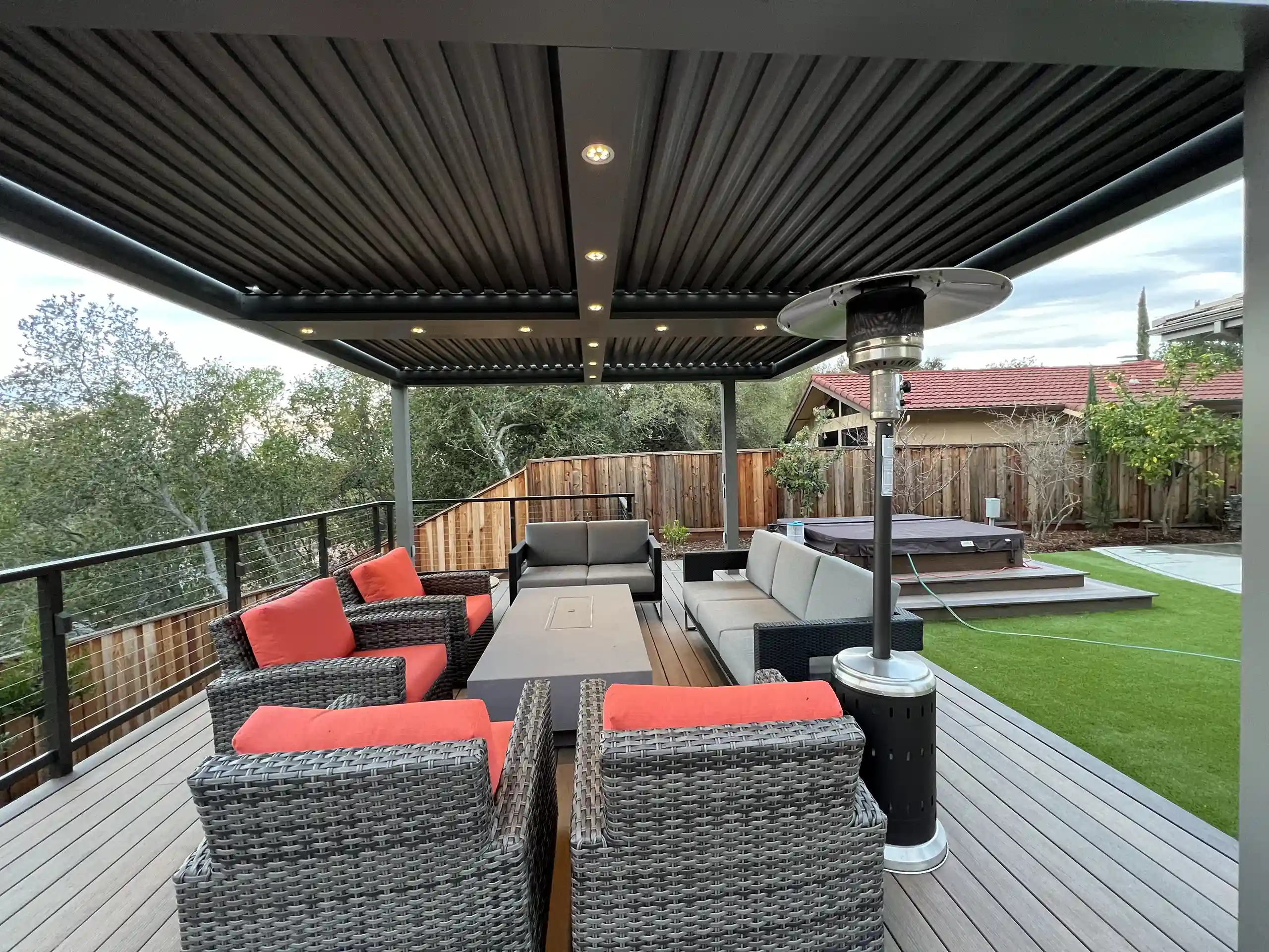 photo of a StruXure Pergola in California with louvered roof and outdoor furniture.