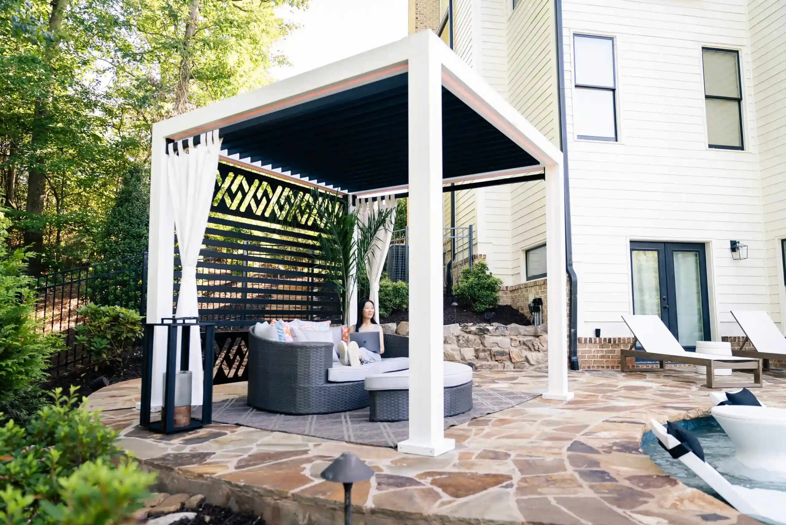 photo of a pool pergola and cabana with privacy features