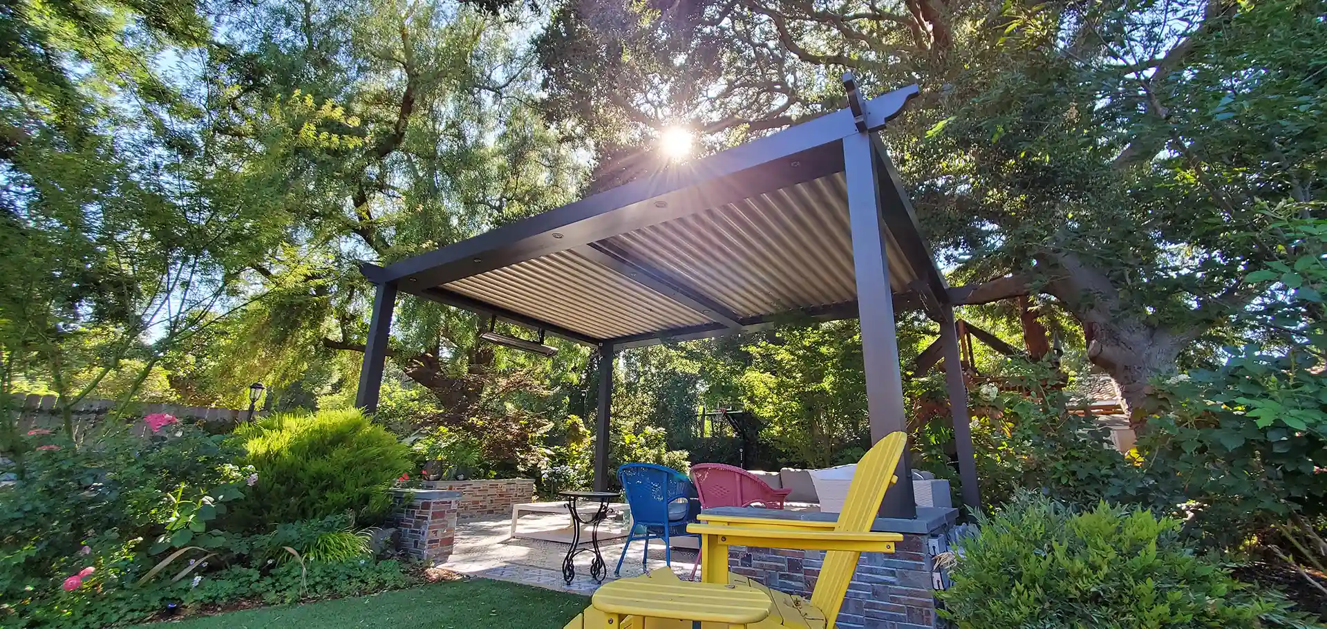 Photo of a StruXure pergola in a wooded environtment
