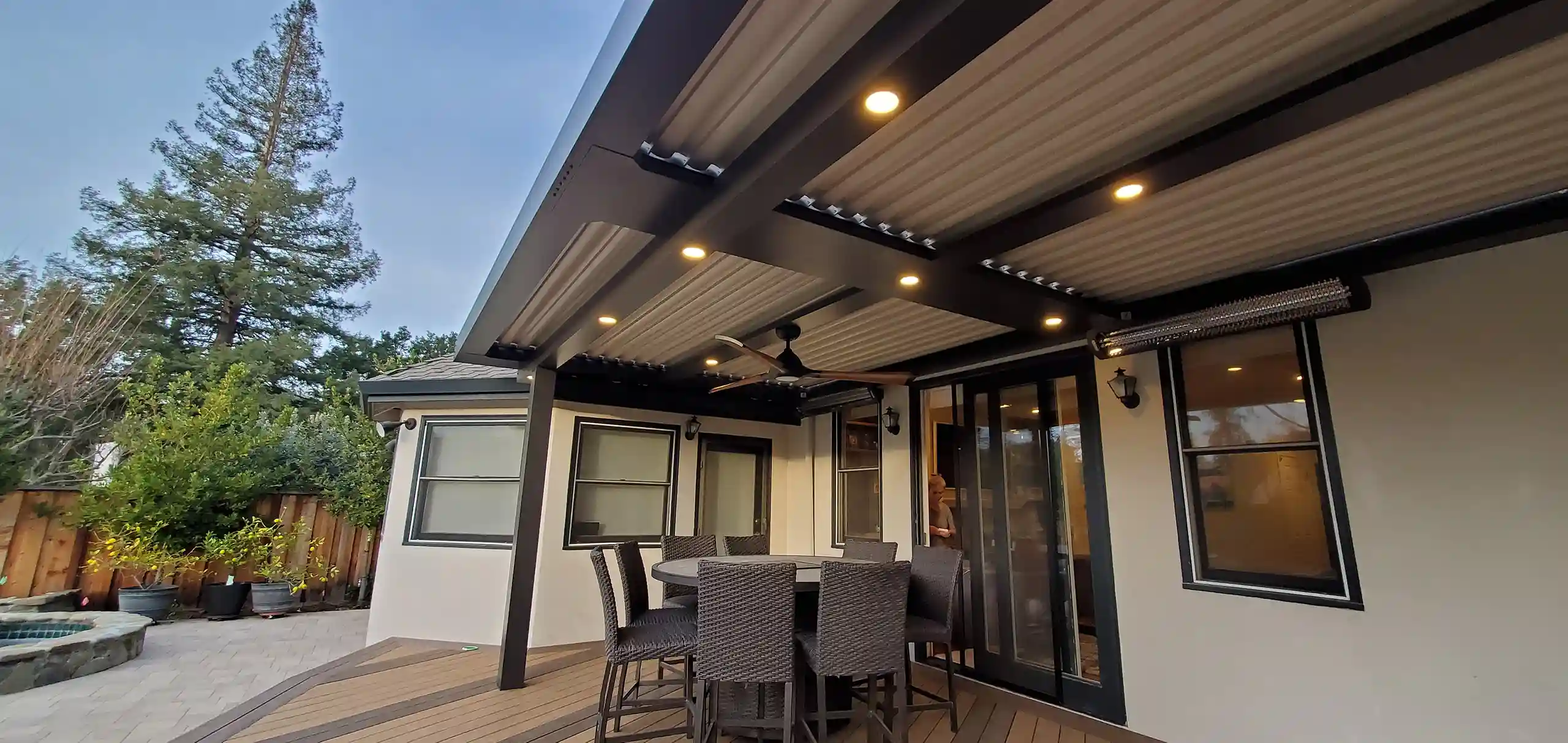 Photo of a louvered roof StruXure pergola with pergola lighting