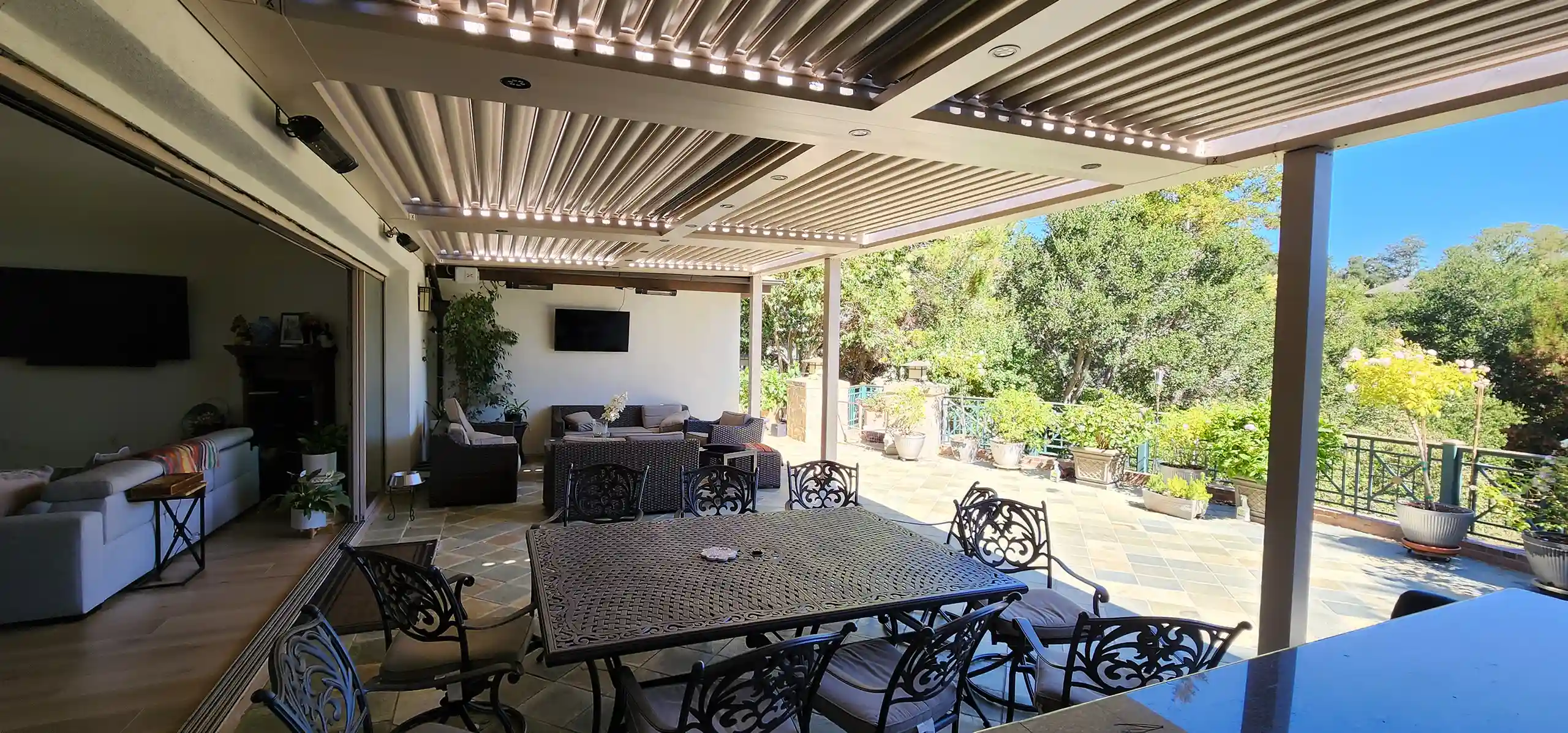 Photo of a louvered roof pergola by StruXure NorCal, a pergola installer in Redwood City, CA.